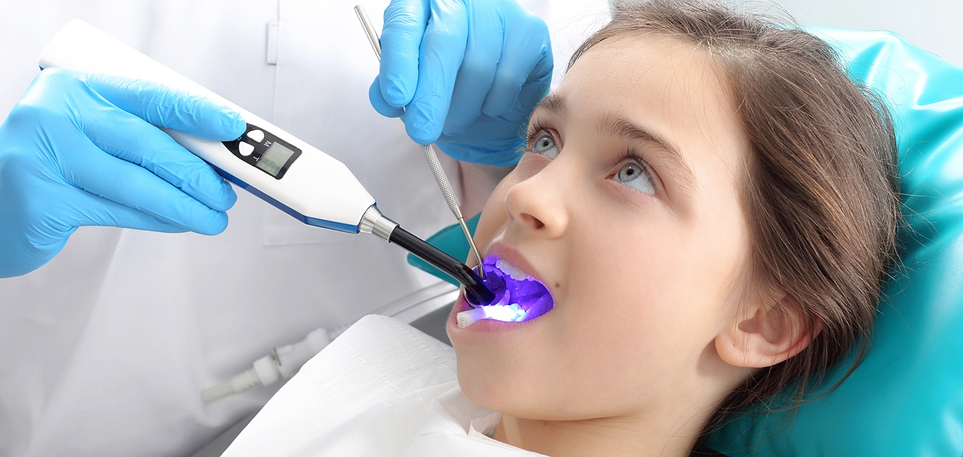 girl getting cavity filled