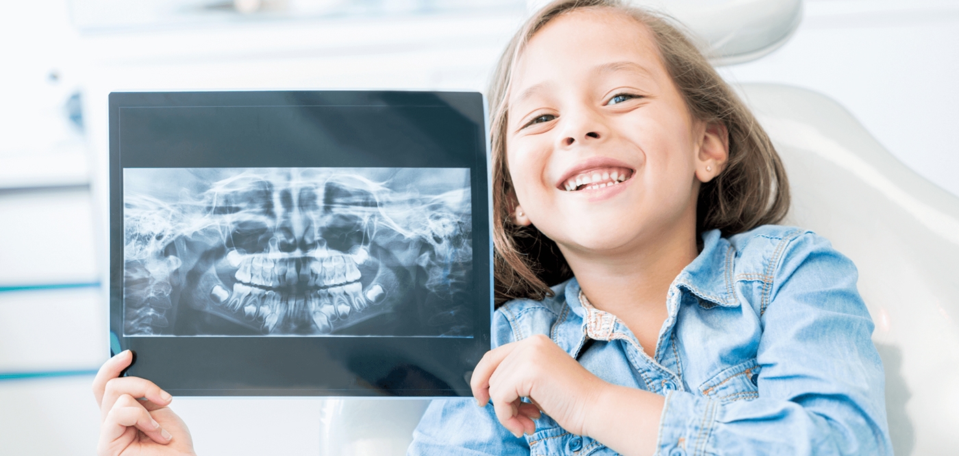 child holding x-ray